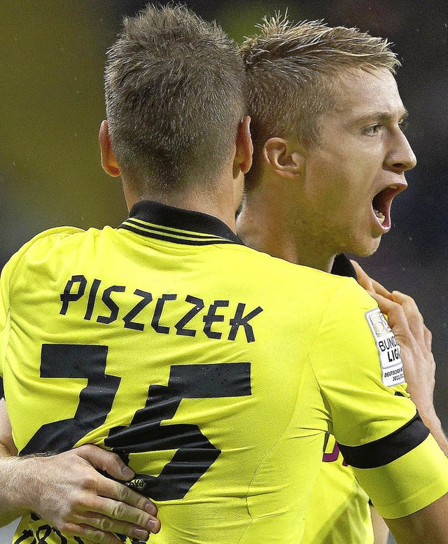 Erzielten die Tore eins und zwei fr den BVB: Piszczek und Reus   | Foto: afp