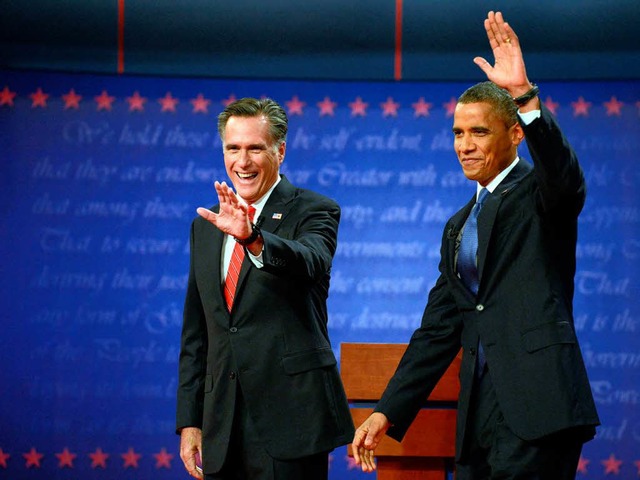 Freundliche Gesten frs TV-Publikum: Mitt Romney, Barack Obama.  | Foto: dapd