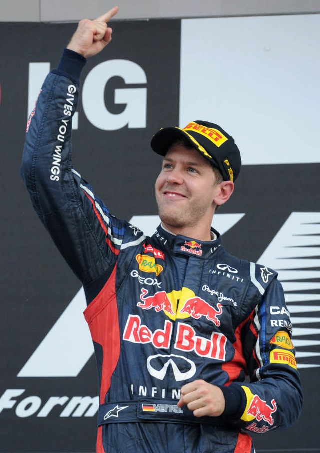 Sebastian Vettel aus Heppenheim konnte...a feiern, sondern auch die WM-Fhrung.  | Foto: AFP