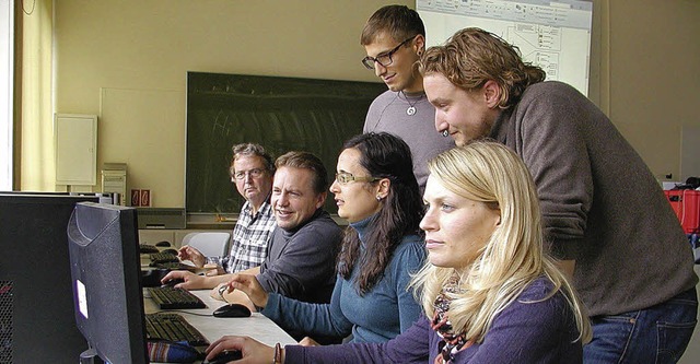 Fr die digital vernetzte Unterrichtsv...lschule gemeinsam  neue Konzepte aus.   | Foto:  WOLFGANG ADAM