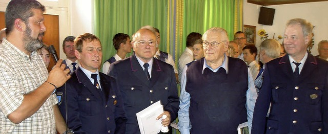 Fr langjhrige Mitgliedschaft geehrt:...rmeister Michael Scharf (von rechts).   | Foto: Erhard Morath