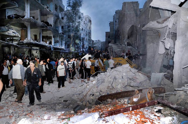 Syriens staatliche Nachrichtenagentur ...dieses Foto des Anschlags in Damaskus.  | Foto: dpa
