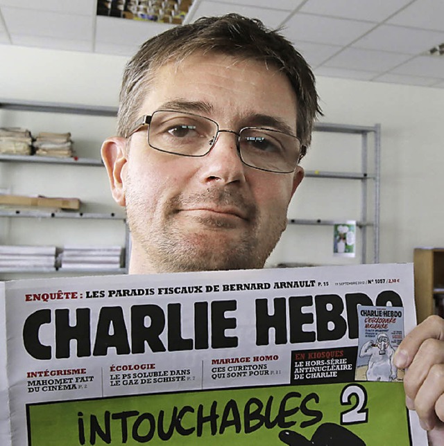 Charb mit dem Satireblatt   | Foto: dapd
