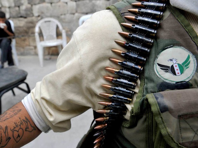 Ein Kmpfer der syrischen Opposition.  | Foto: AFP