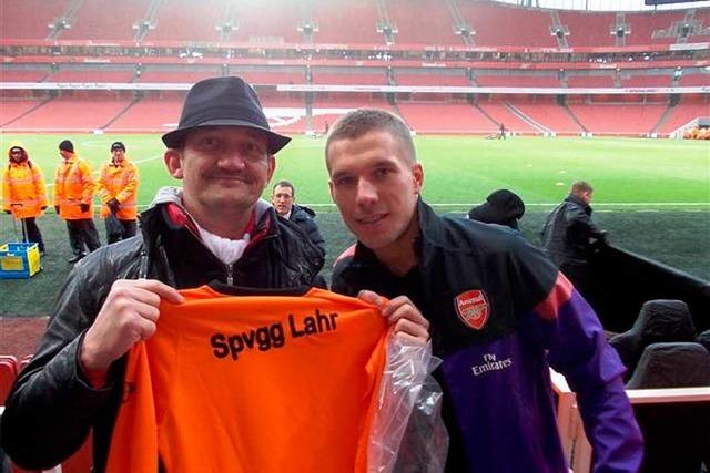 Uwe Hofmann trifft Lukas Podolski in London