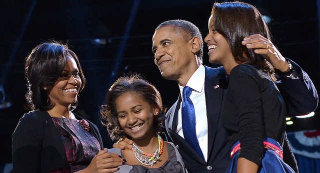 Barack Obama feiert mit seiner Frau Mi...ngern in seiner Heimatstadt Chicago.    | Foto: afp