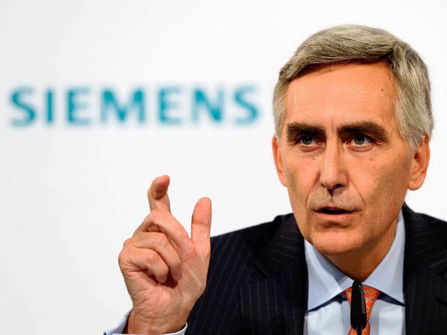 Siemens-Chef Peter Lscher will auch w...ufen, um das Personal zu verkleinern.   | Foto: AFP