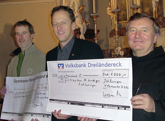 Pater  Marian Rybek (rechts), Dirigent..., Prsident des Lions Club Schliengen   | Foto: Lions Club