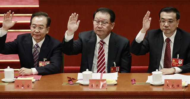 Premier Wen Jiabao, Propaganda-Chef Li...beim Parteitag am Mittwoch (von links)  | Foto: DPA