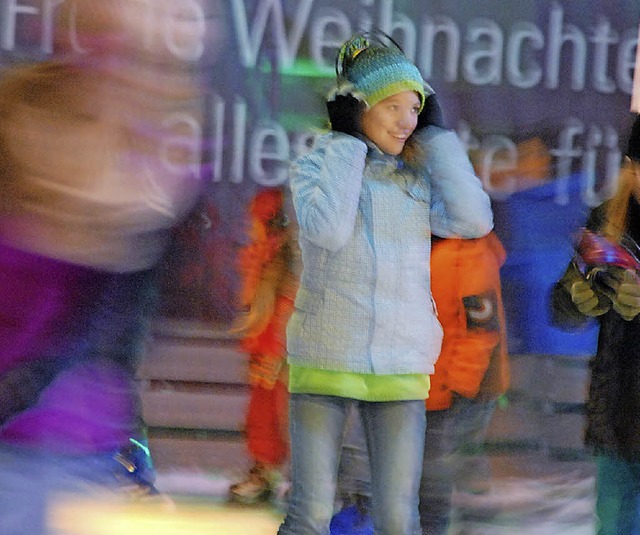 Kopfhrer statt &#8222;Eisbahndauermus...elung&#8220; auf dem Weihnachtsmarkt.   | Foto: Siefke