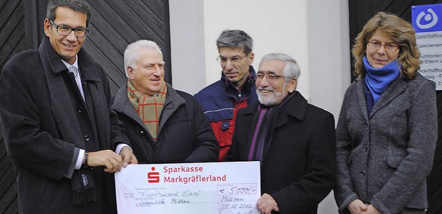 Spende fr die Lebenshilfe:  Gerd Lehm...orstand, Peter Ross und  Susann Hain.   | Foto: Ehrlich