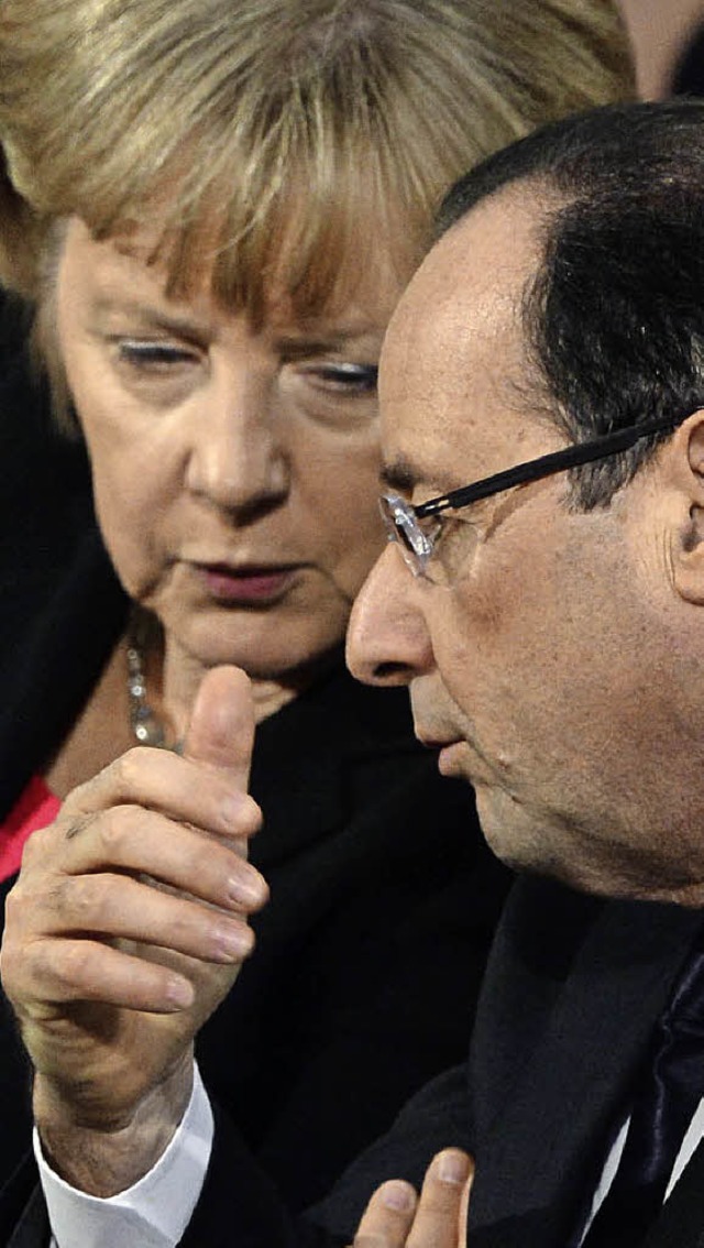 Blieben an diesem Tag Statisten: Bunde...kel und Frankreichs Premier Hollande.   | Foto: AFP