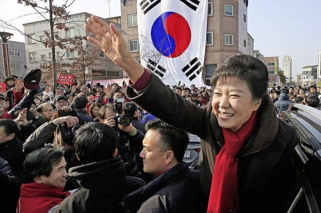 Eine Frau fhrt Sdkorea