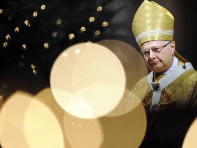 Der Freiburger Erzbischof Robert Zolli...i seiner Weihnachtspredigt im Mnster.  | Foto: dpa