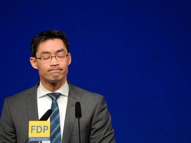 Auf den FDP-Vorsitzenden  Philipp Rsl...r wie ein meterhoher Sperrzaun wirken.  | Foto: dpa