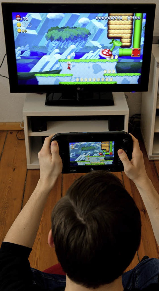 Konsole oder Handheld? Ein Spiel wie &...Wii U theoretisch auch ohne Fernseher.  | Foto: dpa-tmn