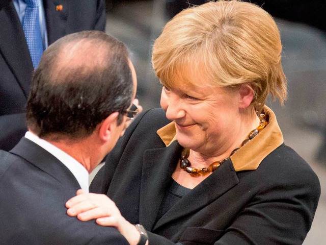 Ihre Freundschaft gehrt zur Staatsrs...: Franois Hollande und Angela Merkel   | Foto: dpa