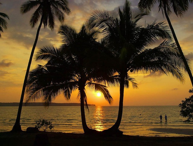 Palmen, Meer, Sonnenuntergang: Viele D... diesen Wunsch im Jahr 2013 erfllen.   | Foto: photocase.de/glemourevents