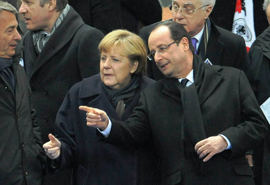 Unter den Zuschauern: Deutschlands Kanzlerin Angela Merkel und Frankreichs  Francois Hollande