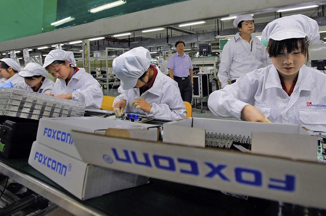 Wegen schlechter Arbeitsbedingungen im...angert: der Elektronikkonzern Foxconn   | Foto: AFP