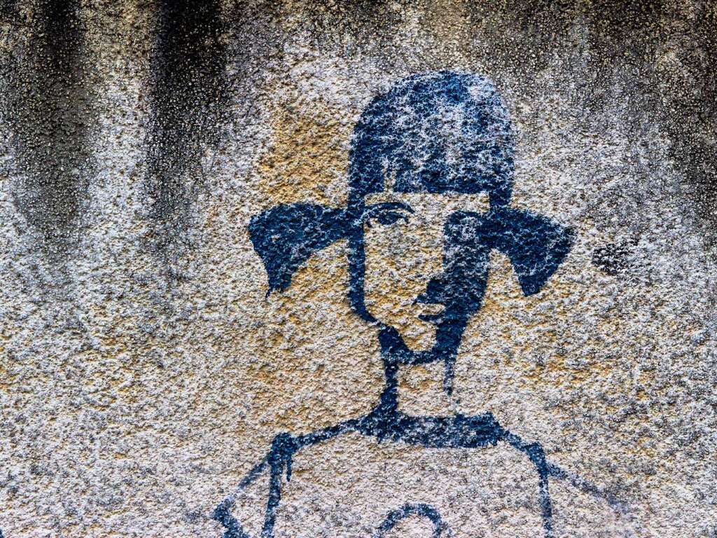 Im Stühlinger steht eine Mauer mit vielen Gesichtern. Im Stühlinger steht eine Mauer mit vielen Gesichtern.