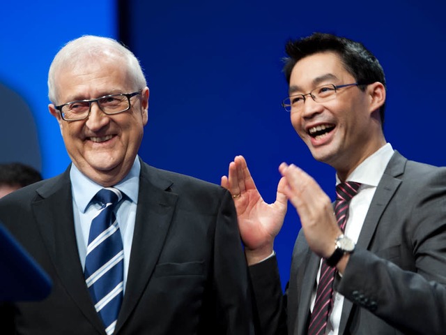 FDP-Chef Rsler (rechts) und FDP-Spitzenkandidat Brderle.  | Foto: dapd
