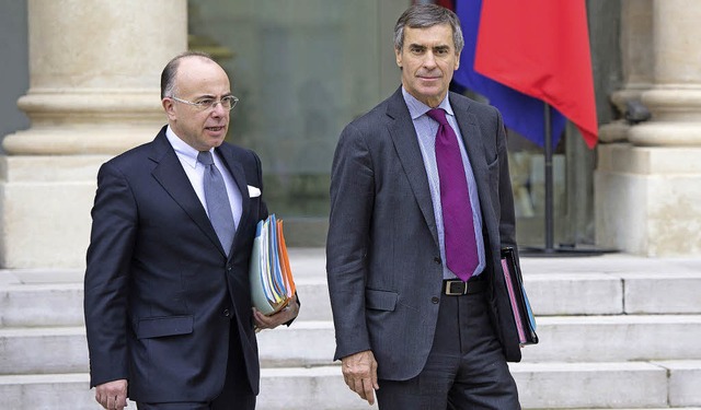 Der neue und der alte Haushaltsministe...Cazeneuve (links) und  Jrme Cahuzac   | Foto: AFP