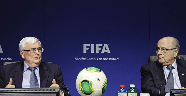 Zwei, die sich offenbar prima ergnzen... (links) und Fifa-Boss Joseph Blatter   | Foto: afp