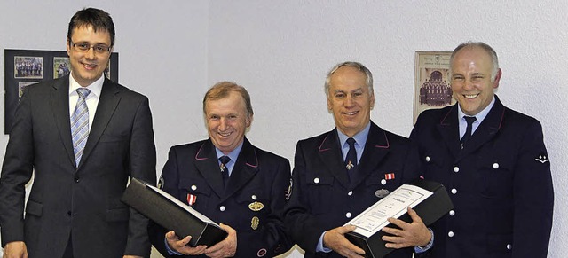 Bei der Hauptversammlung der Feuerwehr...z Ketterer und Kommandant Markus Hog.   | Foto: Privat