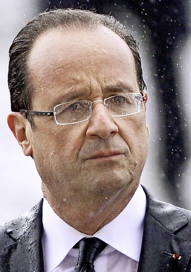 Im Regen: der Staatsprsident  | Foto: AFP