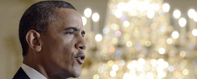 US-Prsident Barack Obama steht aufgru...Nun versucht er den Befreiungsschlag.   | Foto: dpa