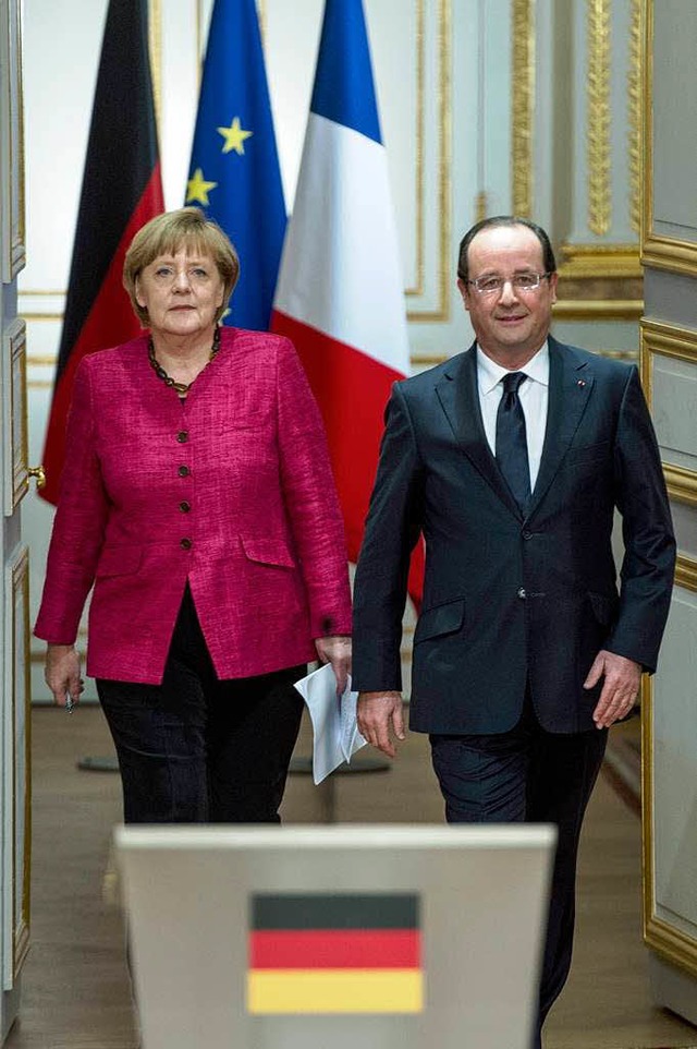 Merkel und Hollande wollen knftig in der Eurokrise besser zusammenarbeiten.  | Foto: dpa