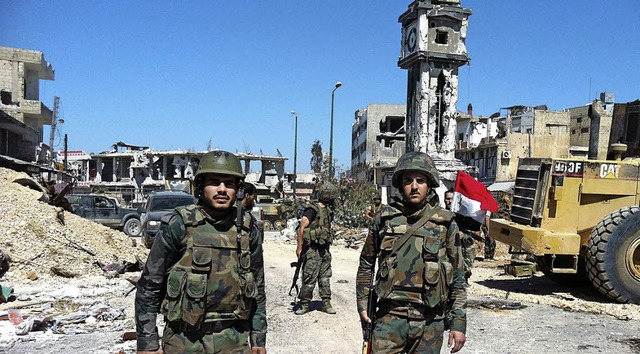 Soldaten der Assad-Armee nach der Einnahme von al-Kusair | Foto: AFP Soldaten der Assad-Armee nach der Einnahme von al-Kusair | Foto: AFP