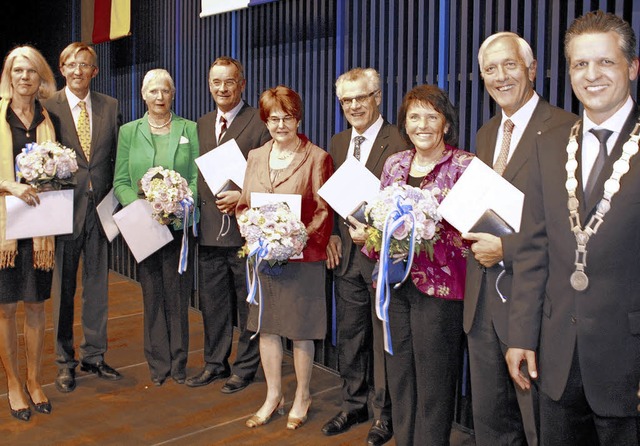 Vier Mal Bronze der Stadt und Blumen f...rud und Norbert Willmann (von links).   | Foto: Vollmer