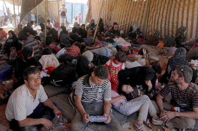 Syrische Flchtlinge in einem jordanischen Aufnahmelager.  | Foto: dpa