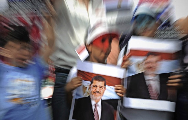 Auch  in Kln gingen am Wochenende Anhnger Mohammed Mursis auf die Strae.  | Foto: dpa