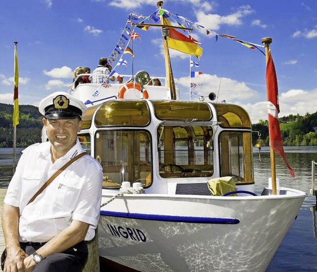 Meinrad Profazi vor seinem Kreuzfahrts...Carola fhrt unter badischer Flagge.  | Foto: Daniel Schnen
