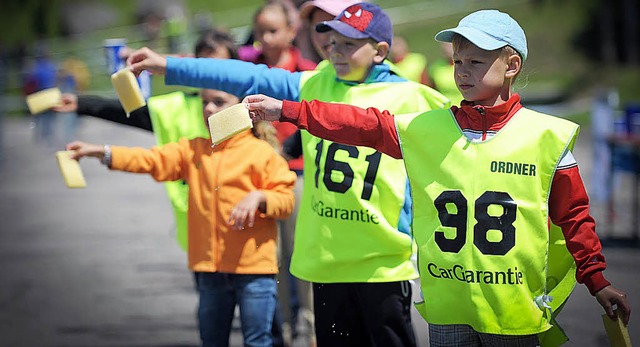 Junge Helfer beim Triathlon Schluchsee  | Foto: HTG