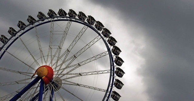 In einem Riesenrad unter Wolken: Das i...en Kings Roman &#8222;Joyland&#8220;.   | Foto: dpa