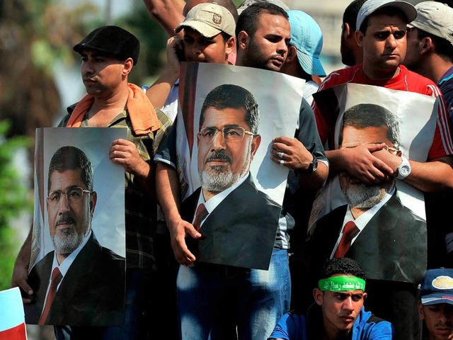 Mursi-Anhnger fhlen sich von der Regierung systematisch schikaniert.  | Foto: dpa