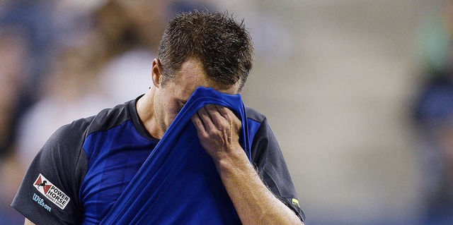 Philipp Kohlschreiber nach seiner Niederlage im Achtelfinale gegen Rafael Nadal   | Foto: DPA