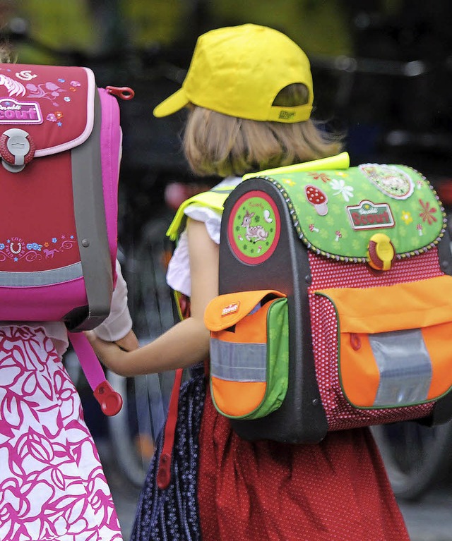 Am kommenden Montag, 9. September, beg...der auf dem Weg zu ihren Schulen sind.  | Foto: caroline seidel (dpa)