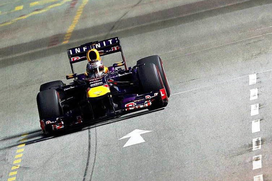 Sebastian Vettel hat auch den Großen Preis von Singapur gewonnen. Der vierte Weltmeistertitel in Serie ist dem Heppenheimer kaum noch zu nehmen. (Foto: dpa) Sebastian Vettel hat auch den Großen Preis von Singapur gewonnen. Der vierte Weltmeistertitel in Serie ist dem Heppenheimer kaum noch zu nehmen. (Foto: dpa)
