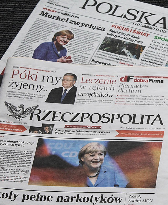 Polnische Medien berichten ber Merkels Wahlsieg.   | Foto: DPA