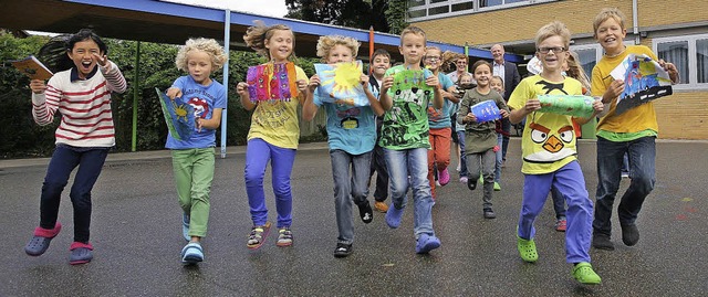 Sie rennen am liebsten zur Schule: Sch...fr den &#8222;Laufbus&#8220; werben.   | Foto: Bastian Henning