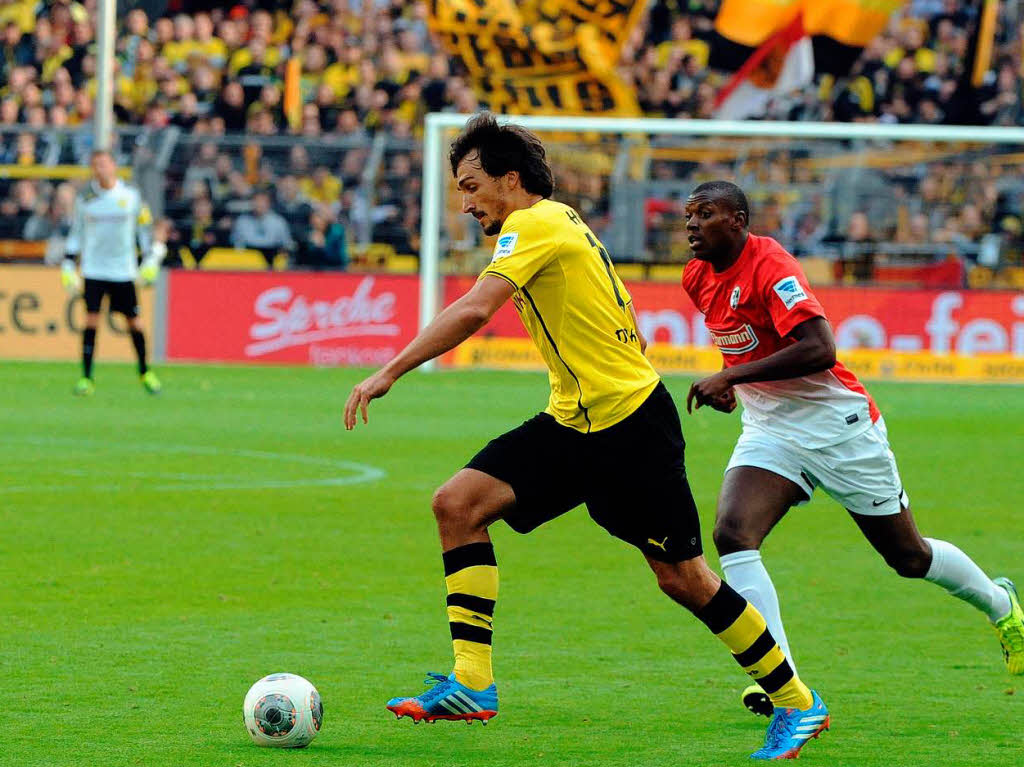 Mats Hummels enteilt Karim Gud.