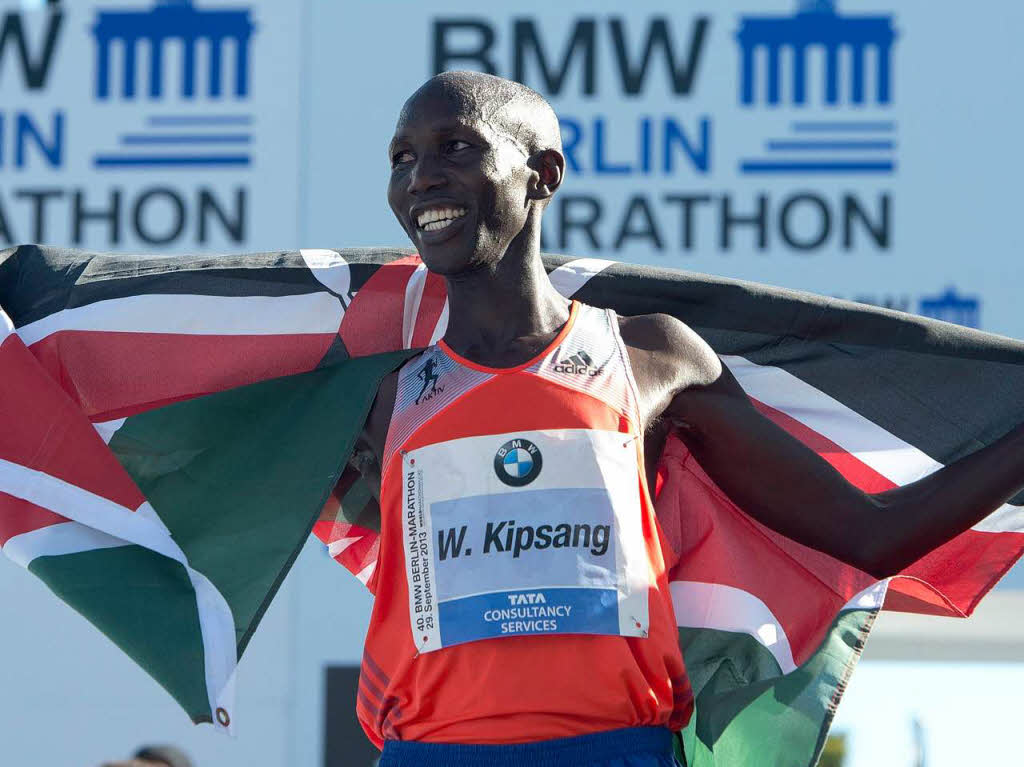 Der Kenianer Wilson Kipsang Kiprotich gewinnt die 40. Ausgabe des Berlin-Marathon in 2:03:23. Das ist Weltrekord.