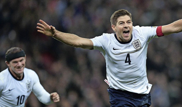 Brasilien, wir kommen: Die Englnder W...even Gerrard nach dem Sieg gegen Polen  | Foto: dpa