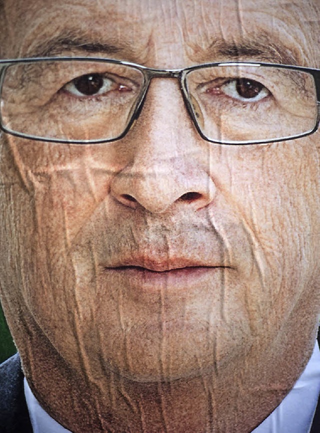 Zerknauscht: Juncker auf einem Wahlplakat   | Foto: dpa