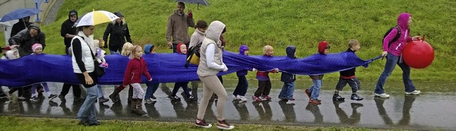 Das ist kein Regenschutz, sondern der ...h, der am Kinderlauf teilgenommen hat.  | Foto: Privat